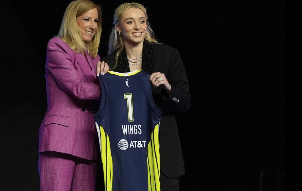 UConn's Paige Bueckers, right, poses for a photo with WNBA commissioner Cathey Engelbert after...